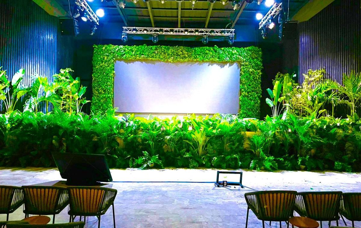 Green wall stage for a corporate event