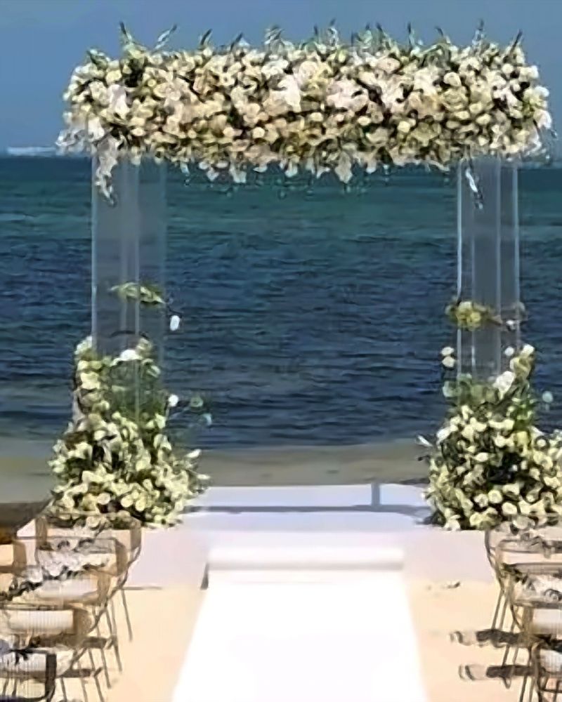 Floral ceremony gazebo on the beach